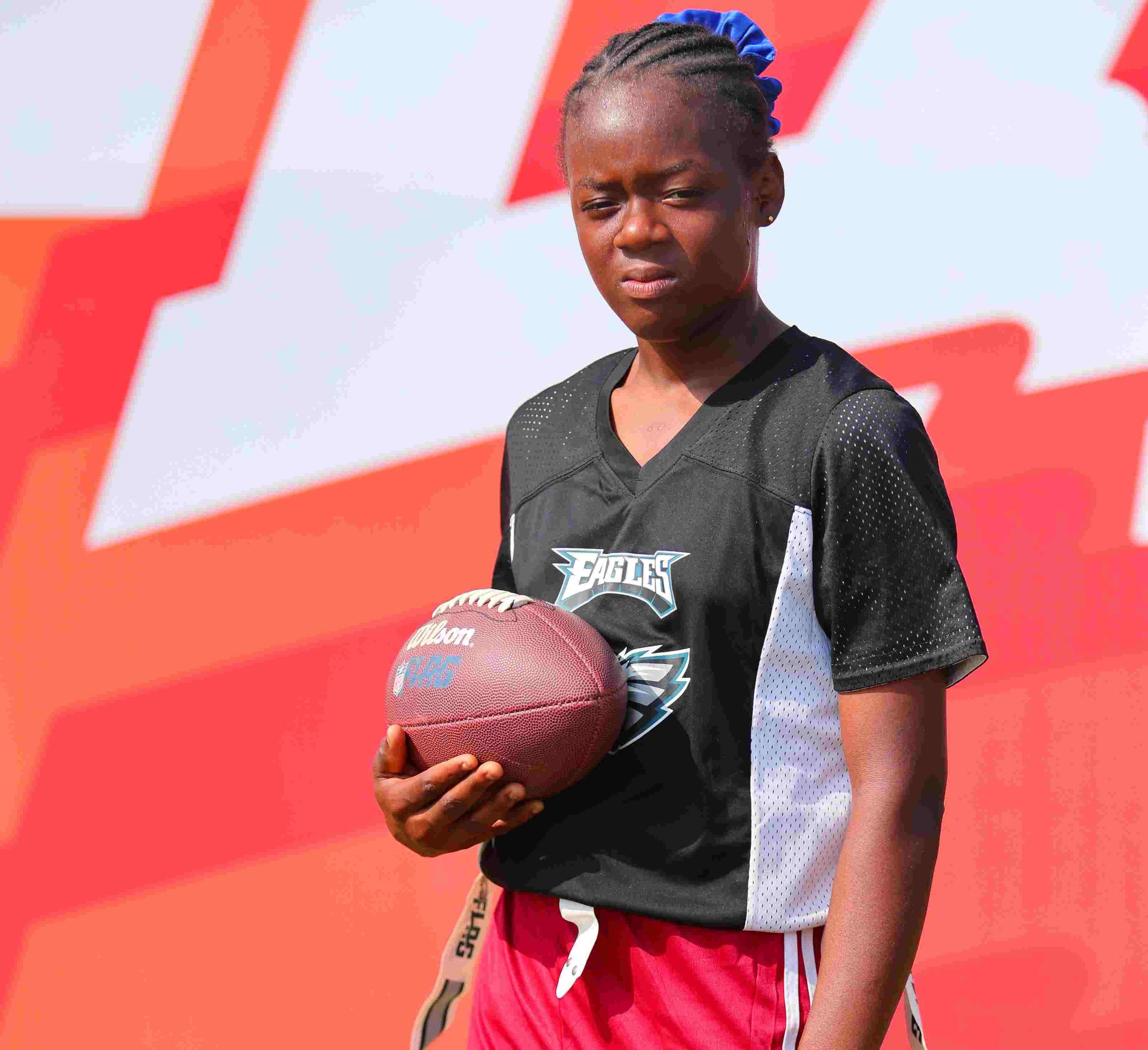 Coaches engaging with children in a community